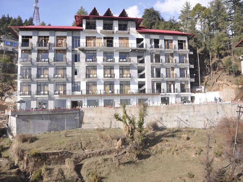 دارامشالا Oyo 28425 Dal Lake Resort المظهر الخارجي الصورة